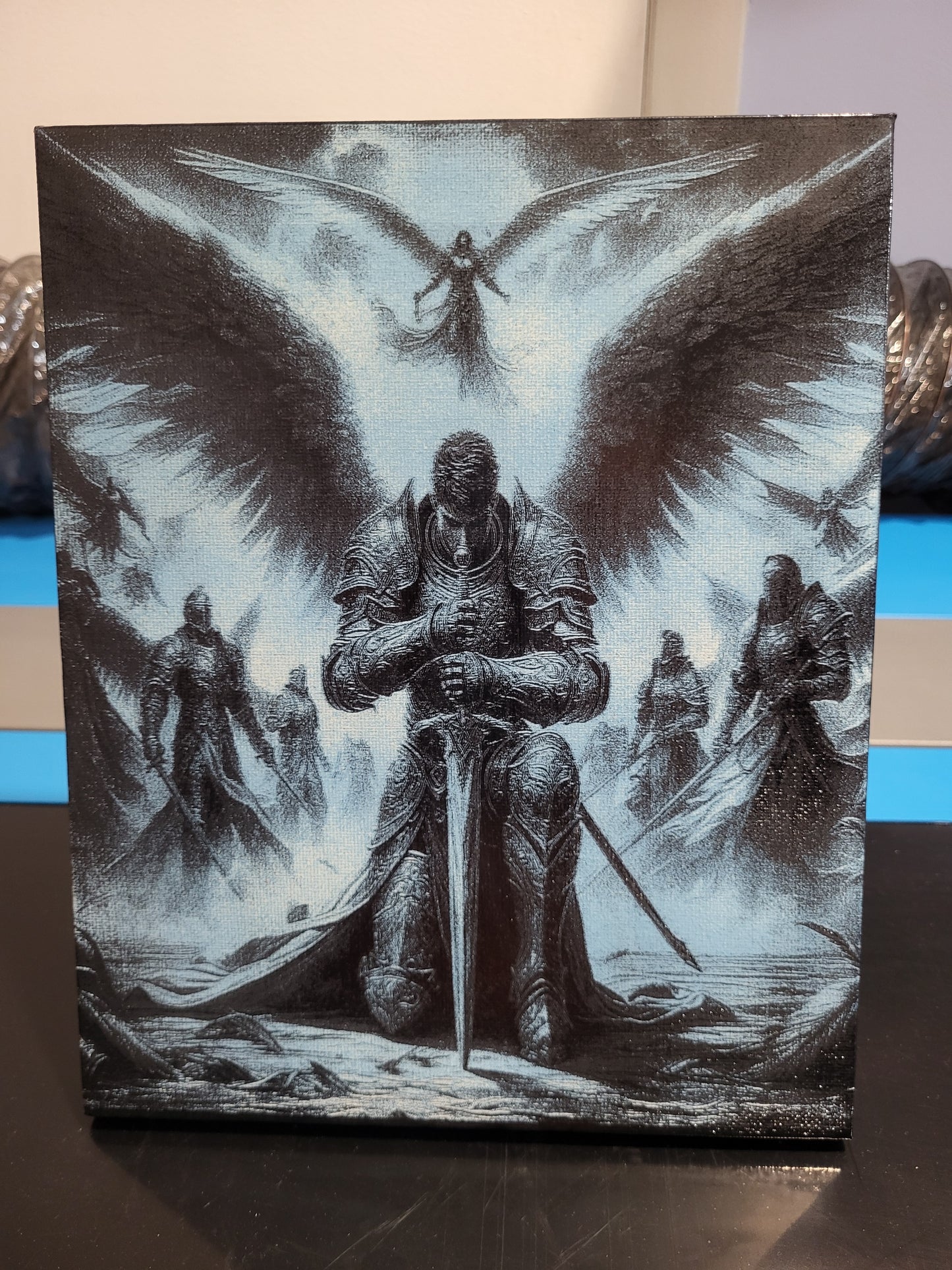 Archangel kneeling engraved on canvas